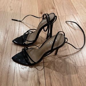 High heeled patent leather sandals